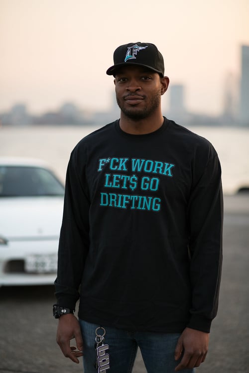 Image of "The Motto" Long Tee's