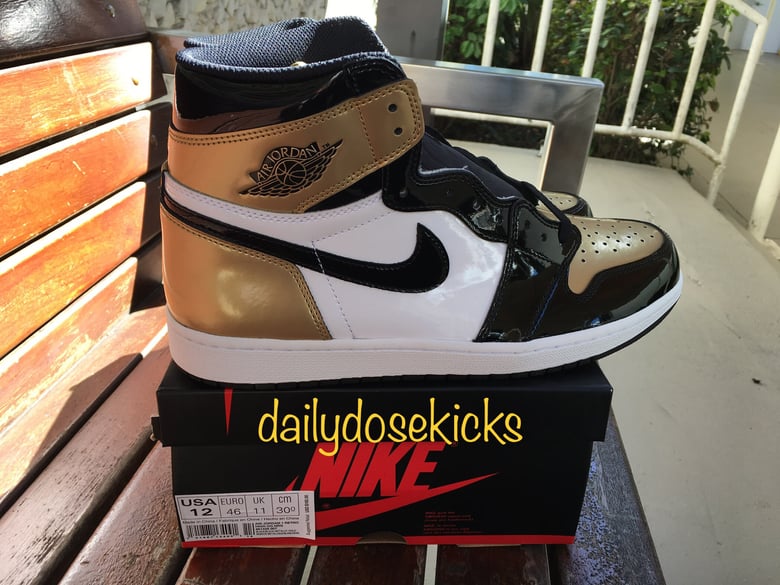 Image of Air Jordan Retro 1 Hi OG NRG “Gold Toe”