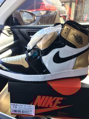 Image of Air Jordan Retro 1 Hi OG NRG “Gold Toe”