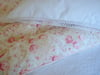 Beautiful "rhubarb" paisley eiderdown in Sarah Hardaker fabric