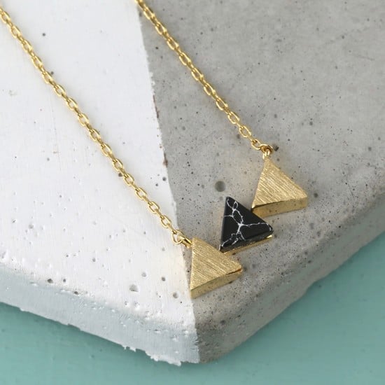 Image of BLACK MARBLE TRIPLE TRIANGLE PENDANT NECKLACE IN GOLD