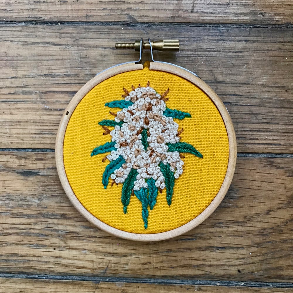 Image of White widow embroidery hoop