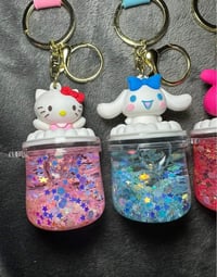 Image 3 of Artoon-acrylic quicksand bottle key, liquid oil bottle for bathtub, key pendant