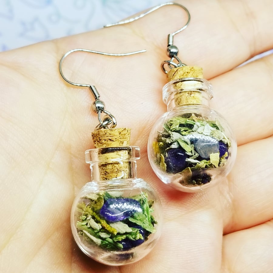 Image of Round glass jar earrings with amethyst & medicines