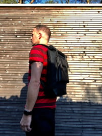 Image 5 of Black waxed canvas rucksack/backpack with roll up top and oiled leather bottem COLLECTION UNISEX