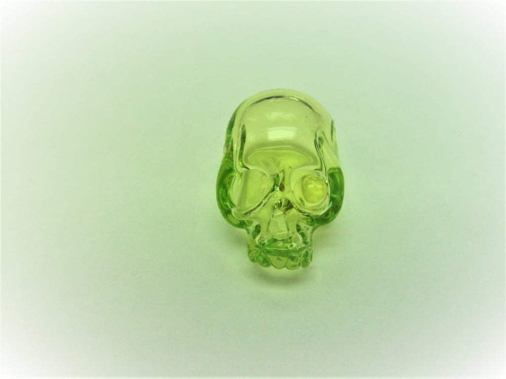 Image of AQUARIUS SNACK SKULL PENDANT HATERADE. U.V. EYE