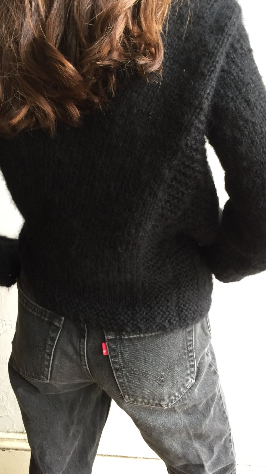 Image of Stellapop Asymmetrical Sweater in Black.