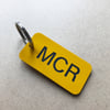 Manchester MCR locker keyring in yellow + black