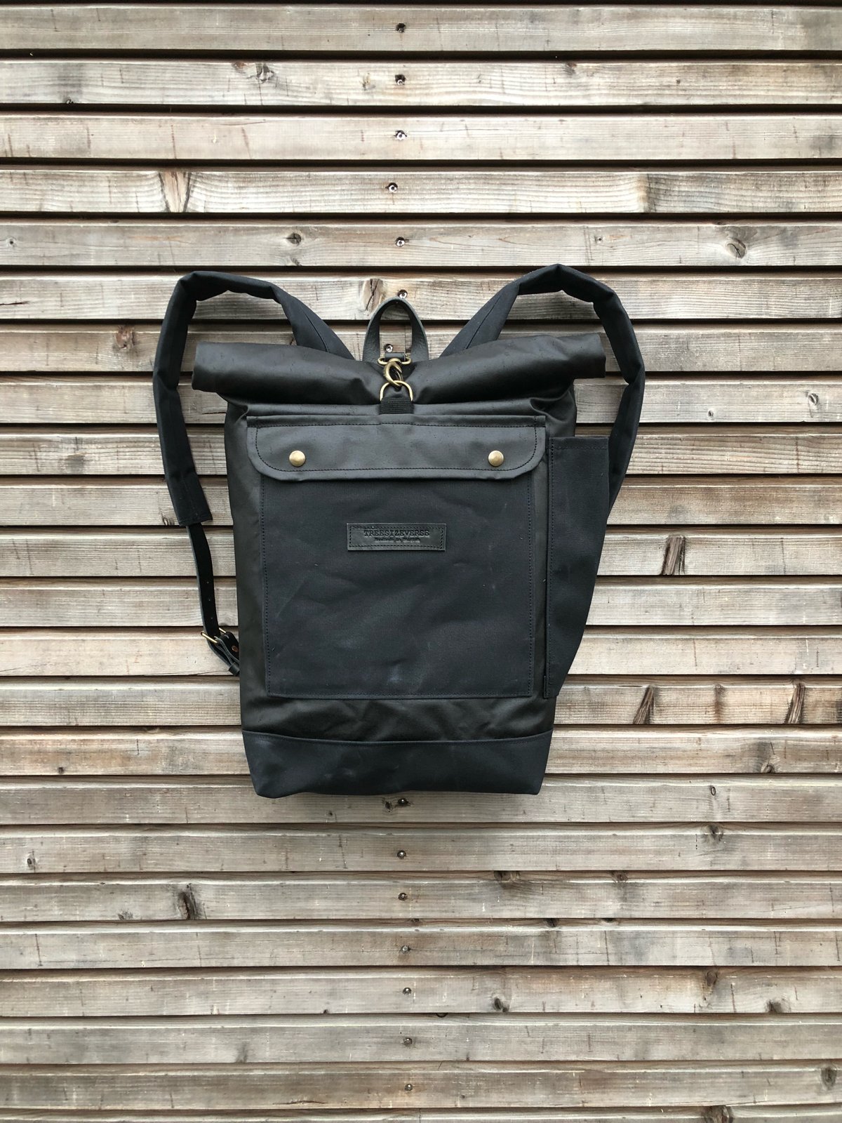 Roll up canvas outlet backpack