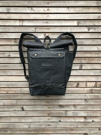 Image 1 of Waxed canvas backpack with roll up top and double waxed bottem COLLECTION UNISEX