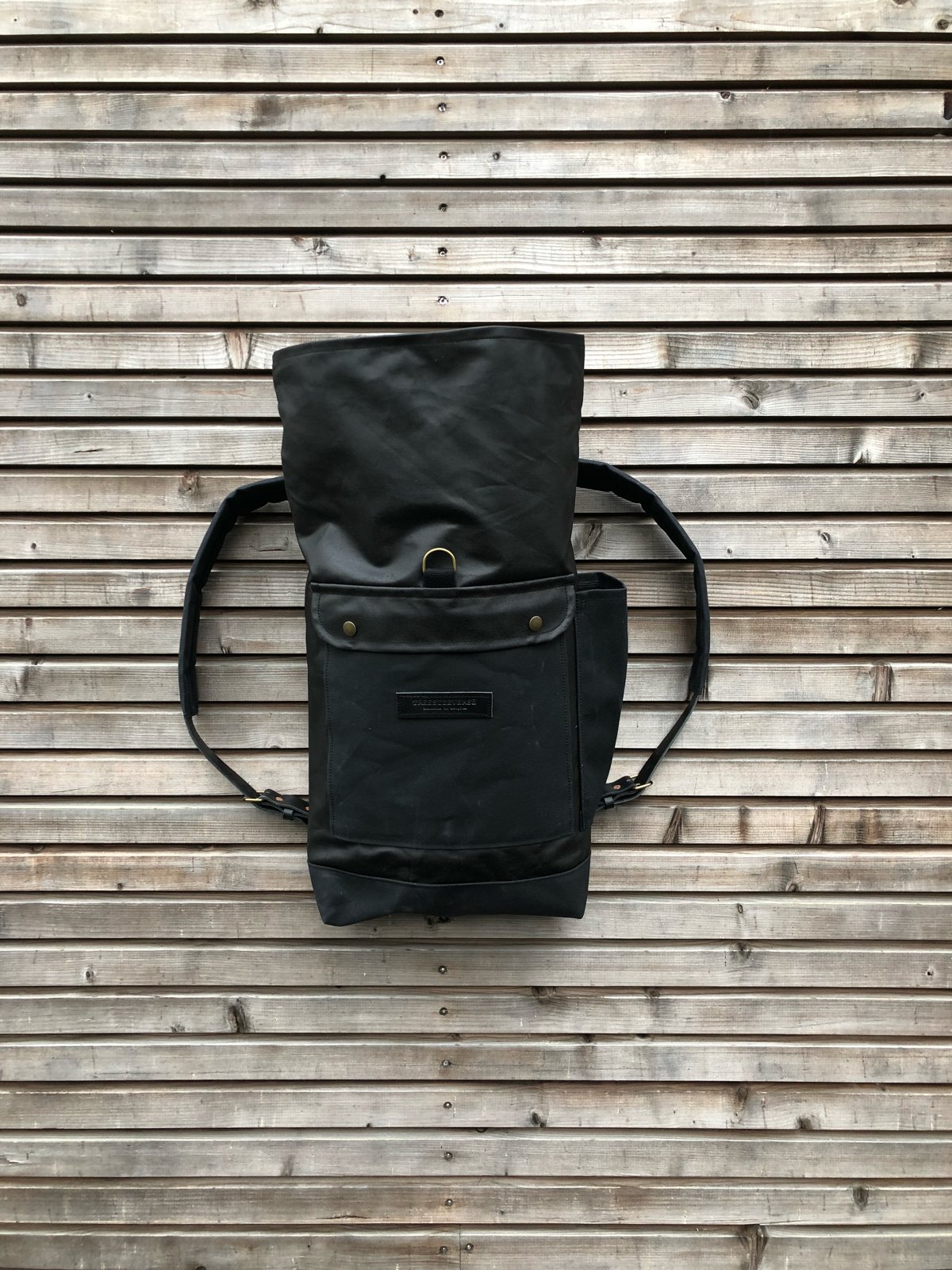 Image of Waxed canvas backpack with roll up top and double waxed bottem COLLECTION UNISEX