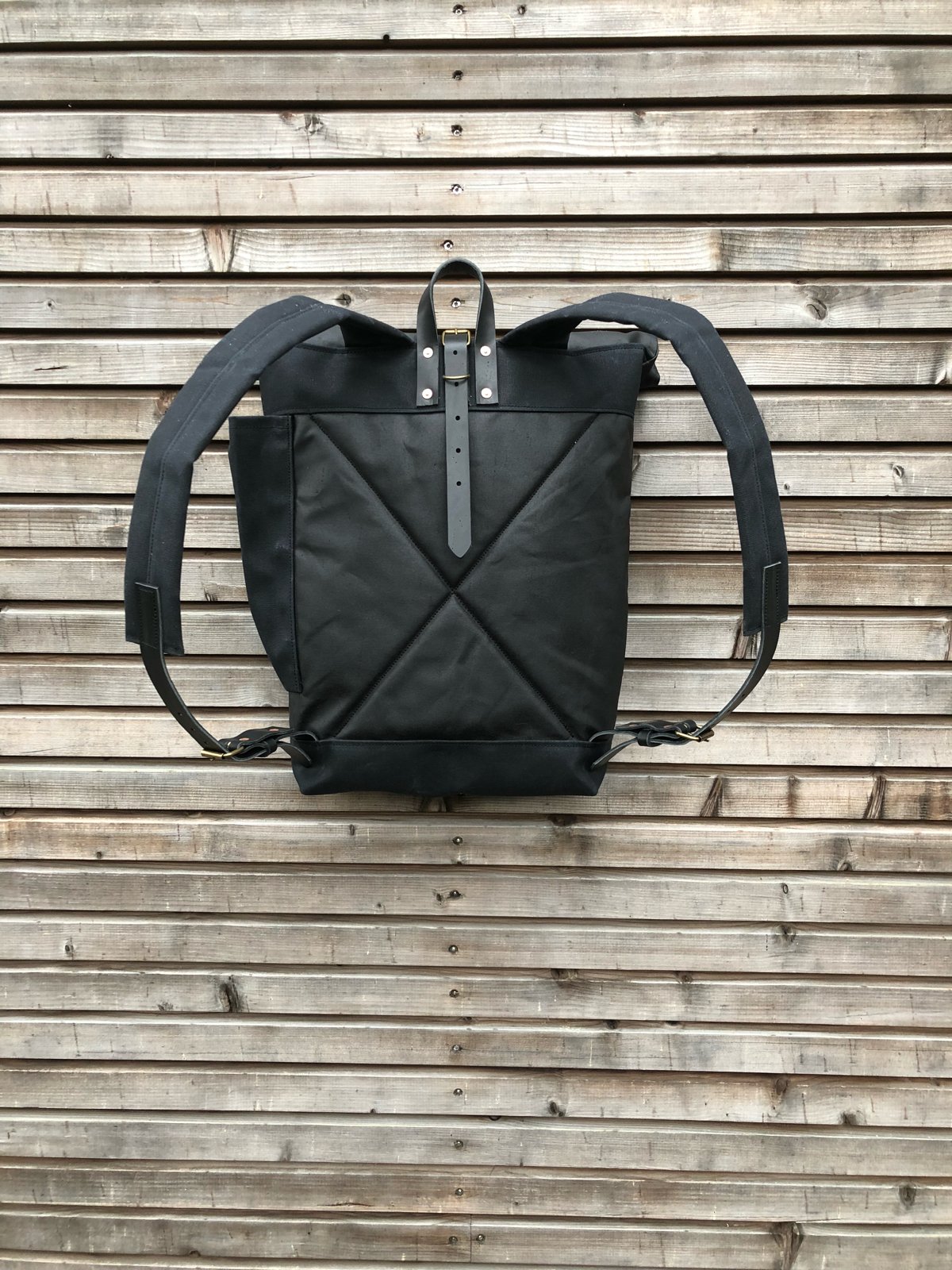 Image of Waxed canvas backpack with roll up top and double waxed bottem COLLECTION UNISEX