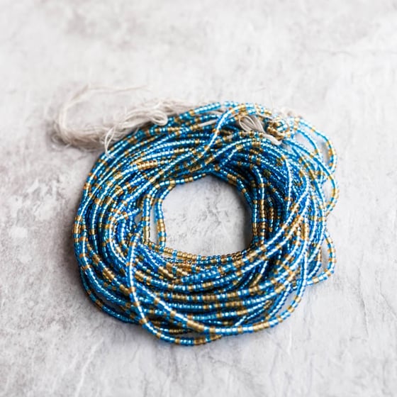 Image of Light blue and Gold mini tie Waist bead