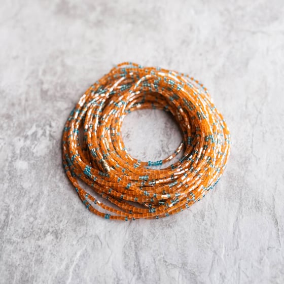 Image of Orange and light blue jewel waist bead