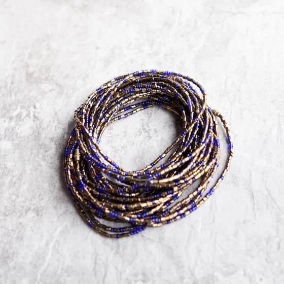 Image of Gold and royal blue glass waist bead