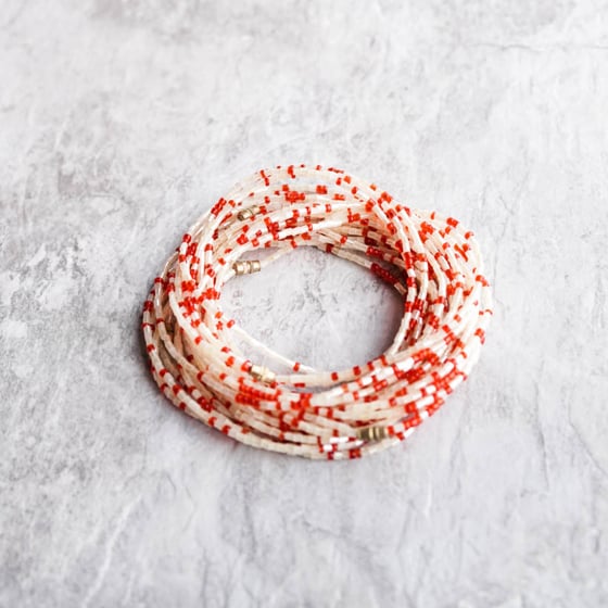 Image of White and red glass bead