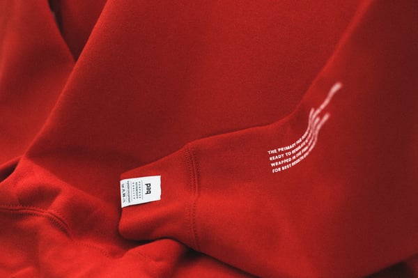 Image of the primary paq: double red sweatshirt