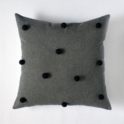 Image of charcoal & black pom pom cushion cover