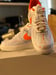 Image of Knicks tape color changing Air Force ones