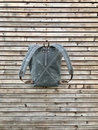 Image 3 of Waxed canvas rucksack in charcoal grey with roll up top and double waxed bottem
