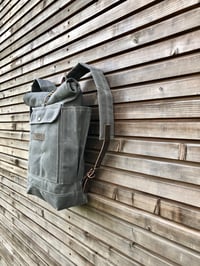 Image 5 of Waxed canvas rucksack in charcoal grey with roll up top and double waxed bottem