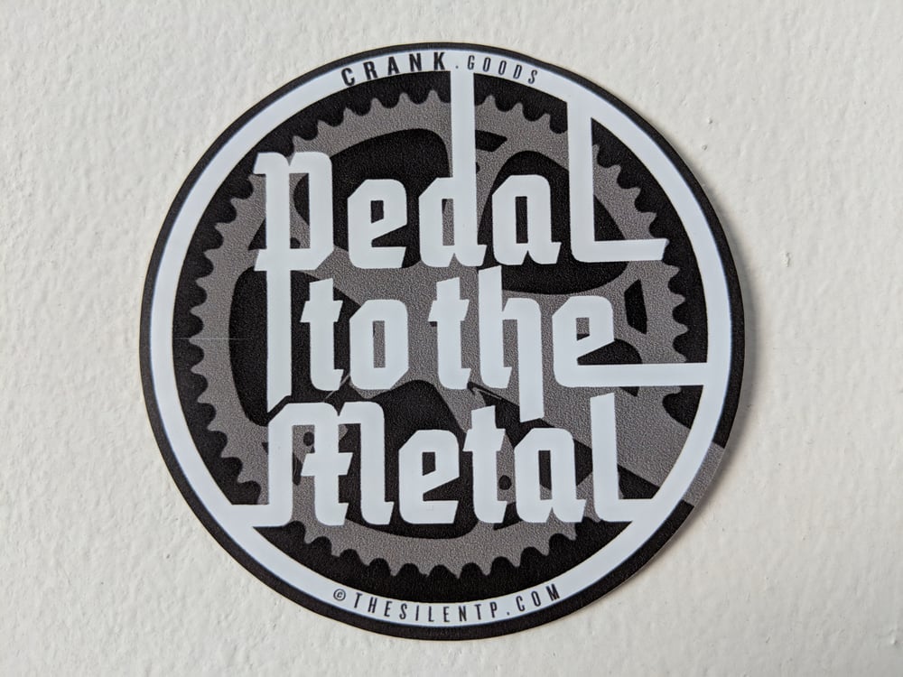 'Pedal to the Metal' matte finish round vinyl sticker.