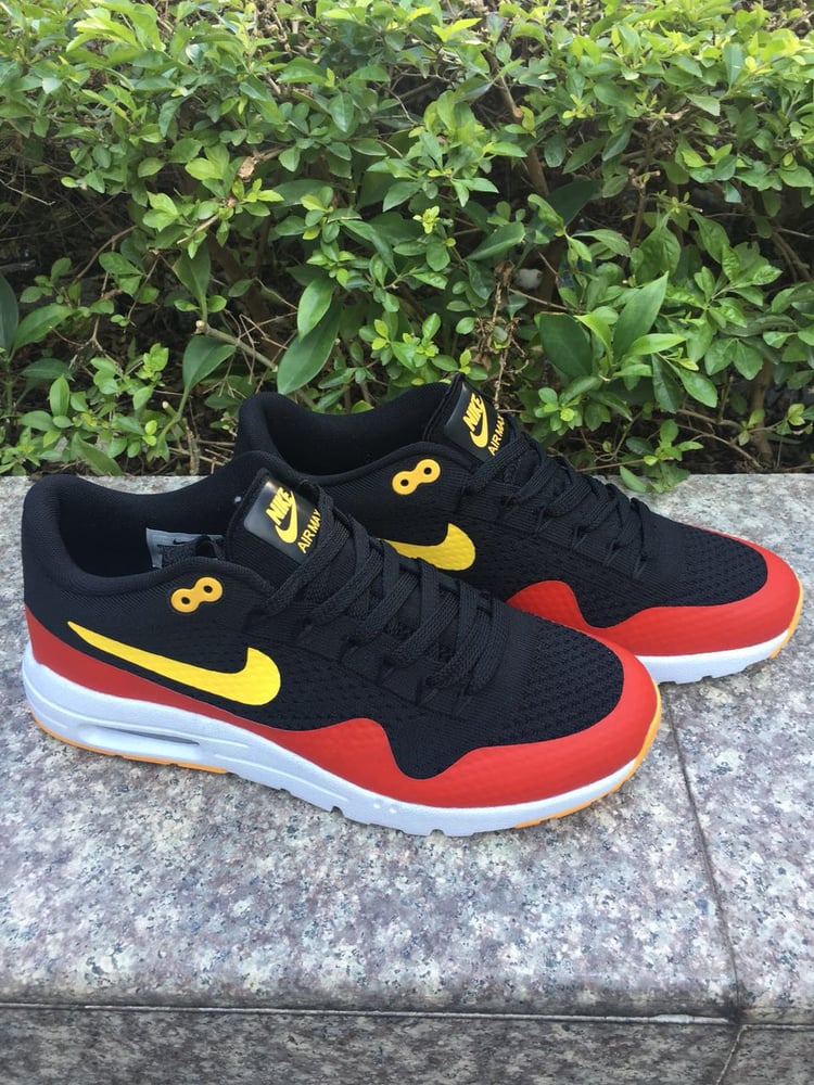 Image of NIKE AIR MAX 1 ULTRA FLYKNIT BLK/RED/YELLOW