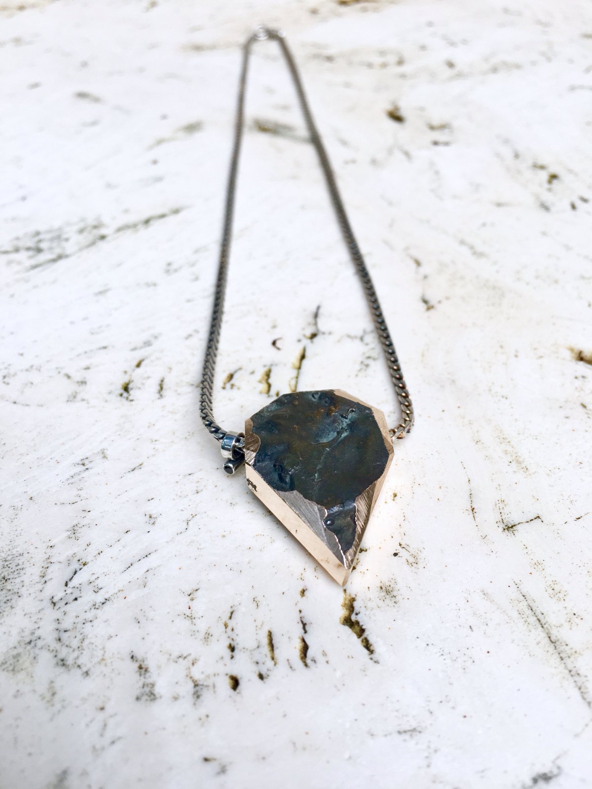 Bronze sculpture black spinel pendant