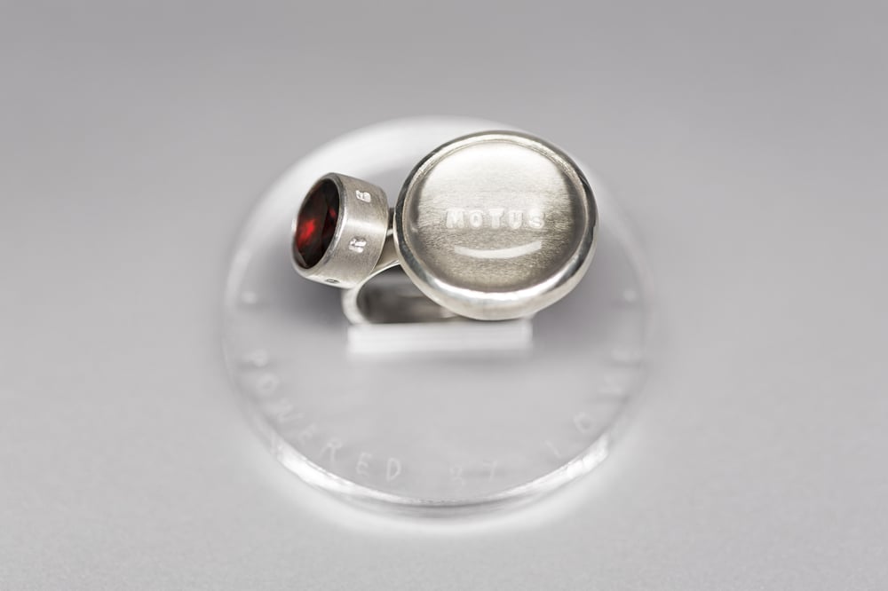 Image of "Powered by love" silver rings with rock crystal and garnet  · MOTUS AMORE ·