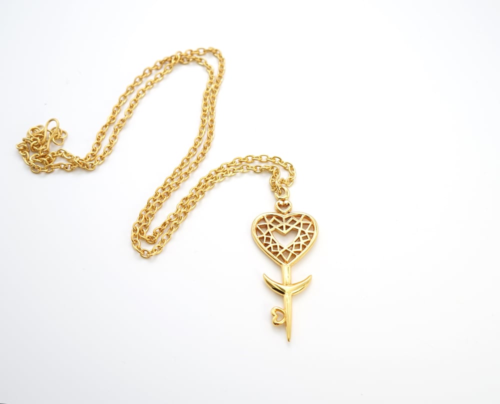 Image of Heart Space Key Pendant in Gold