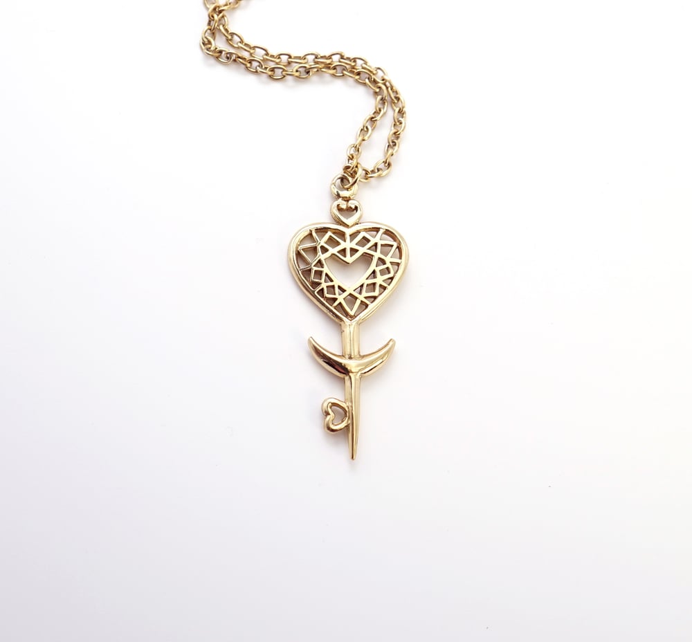 Image of Heart Space Key Pendant in Brass