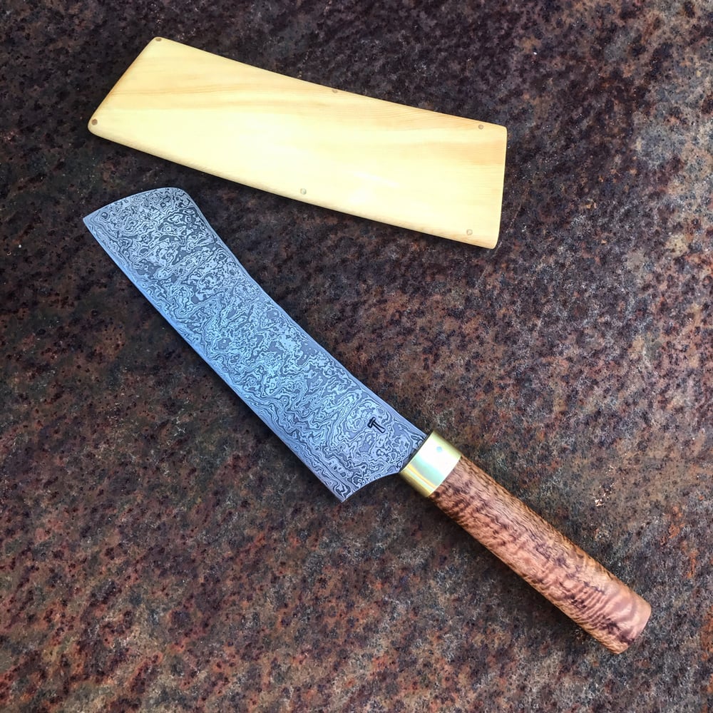 Image of Damascus steel multicultural knife