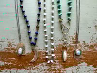 Image 16 of faceted lapis and brown garnet necklace with moon quote pendant
