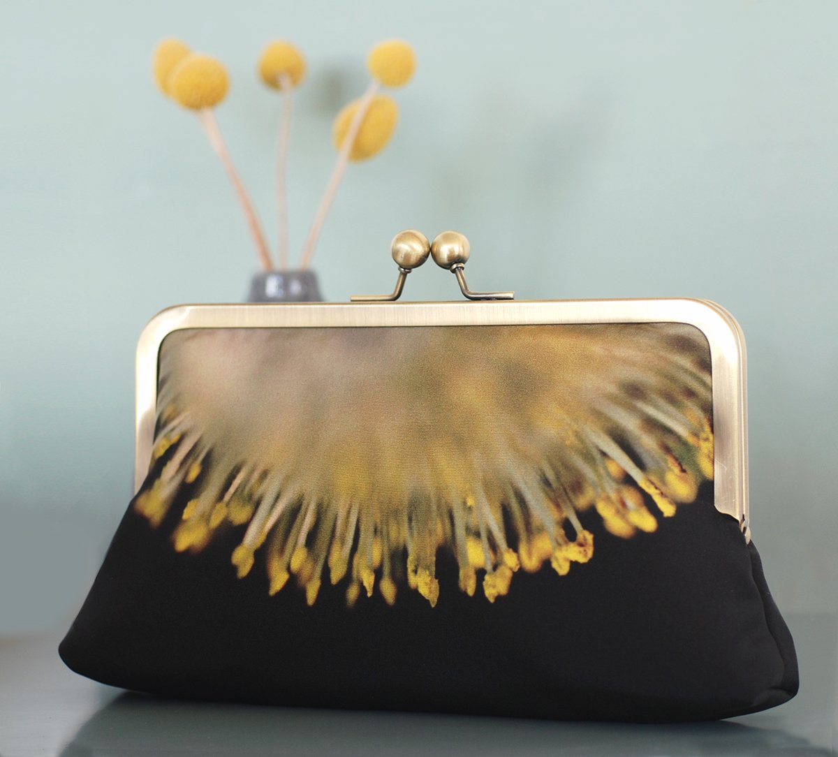 Black and discount yellow clutch bag