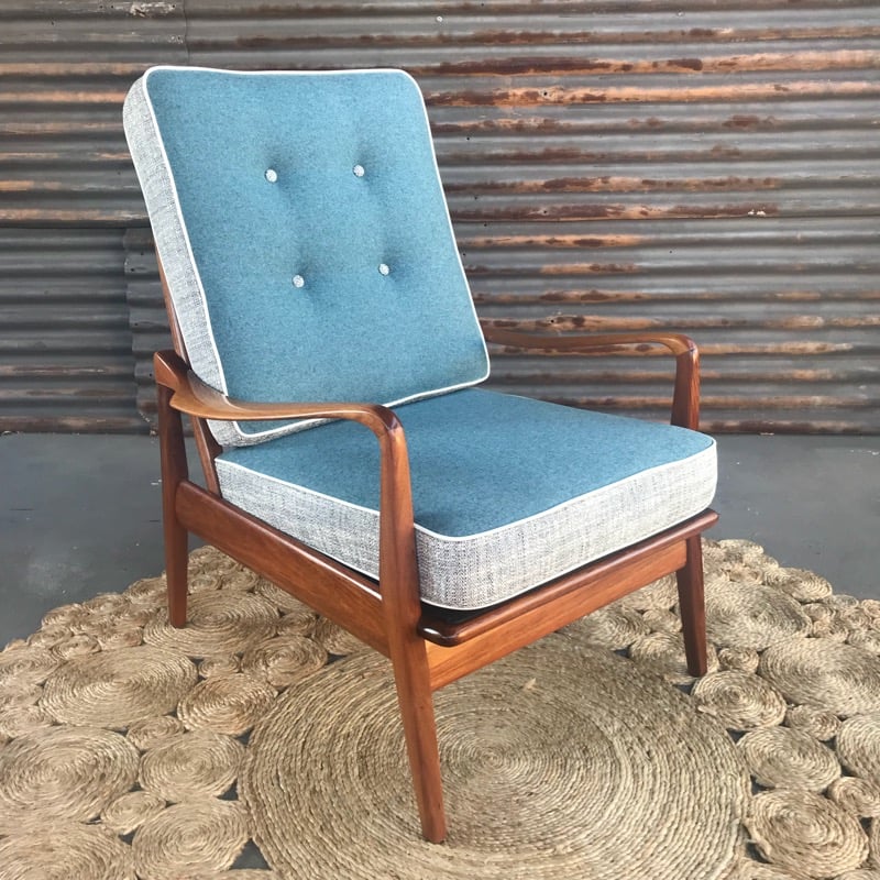 teal and brown chair