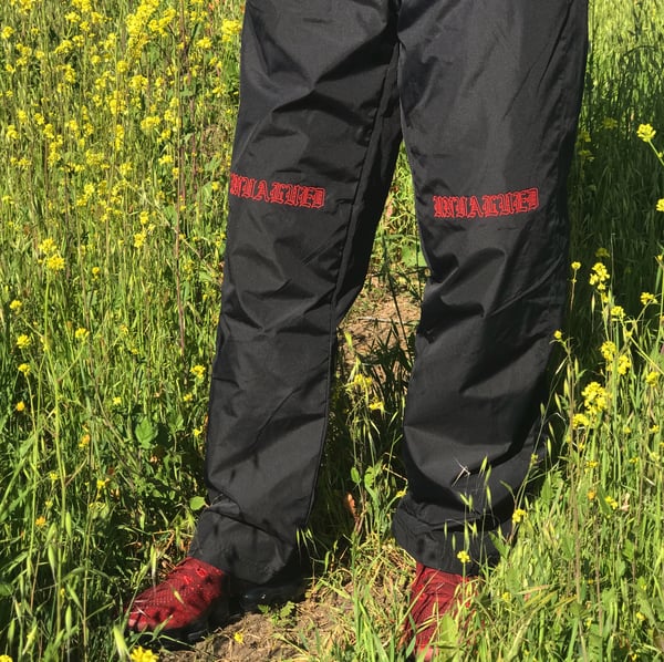 Image of UNVALUED WIND PANTS (BLACK)