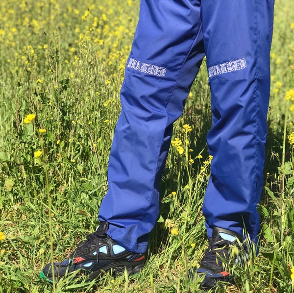 Image of UNVALUED WIND PANTS (BLUE)