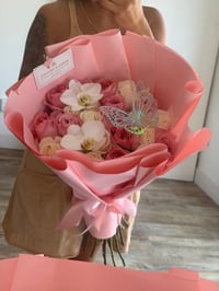 2 dozen pink and white bouquet plus orchids 