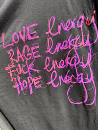 Image 1 of Energies Shirt Black with Purple Writing Size 28 70s Style