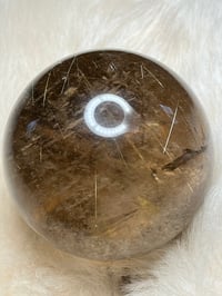 Image 15 of Golden Rutile In Smoky Quartz Sphere #1771