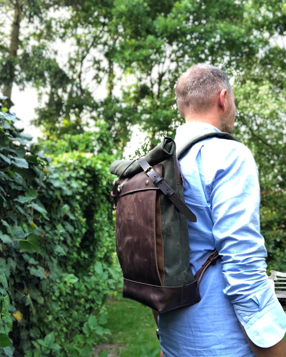 Medium size knapsack backpack in waxed canvas with leather front pocket