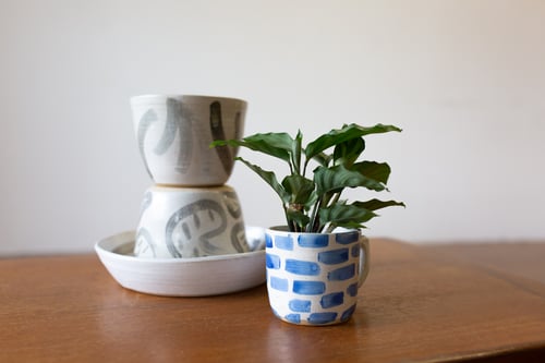 Image of White and Blue Brick Beak Handle Mug