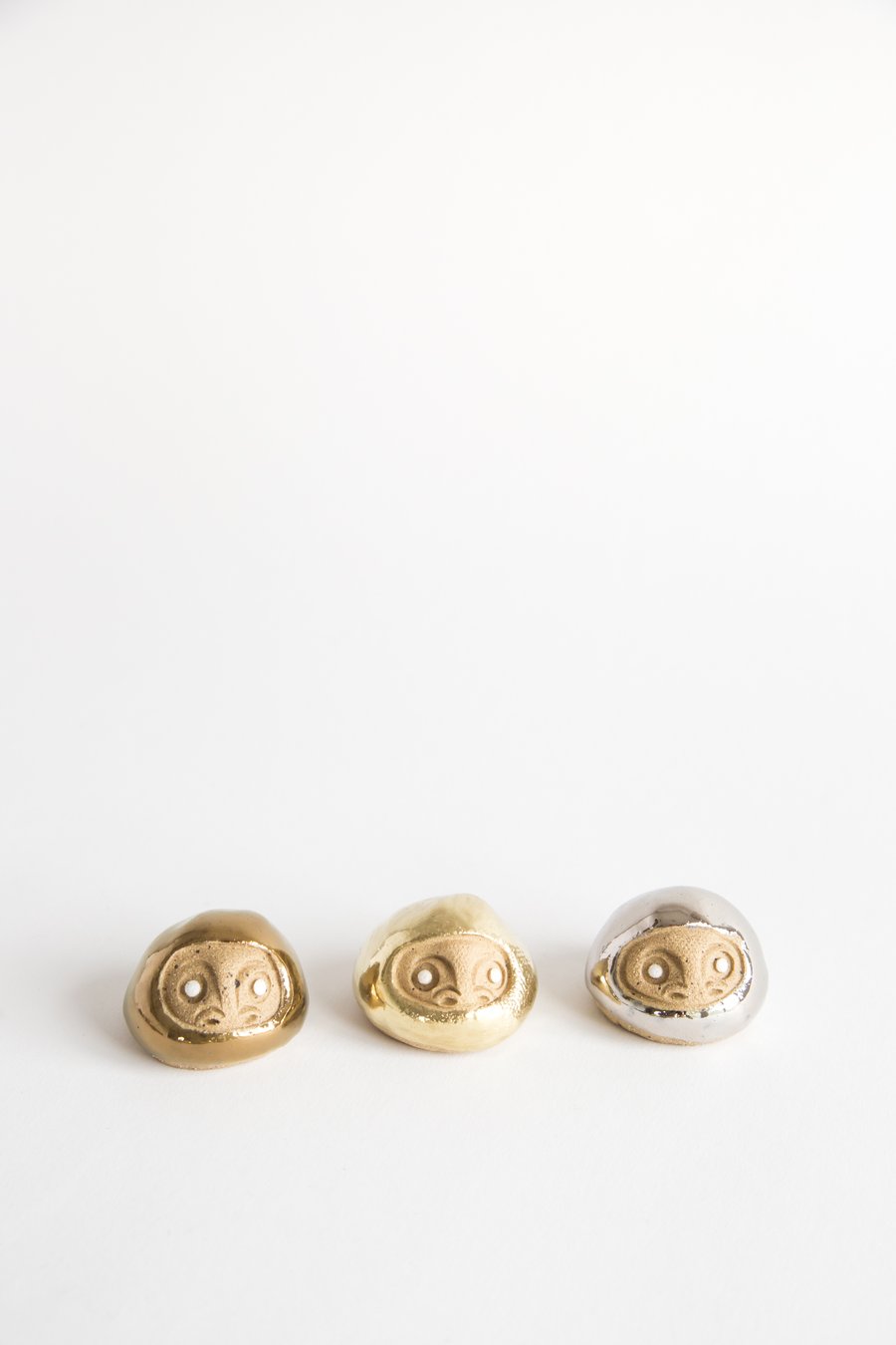 Image of Tiny Golden Daruma Wishing Dolls