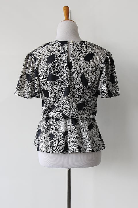 Image of SOLD Geometric Black And White Peplum Blouse