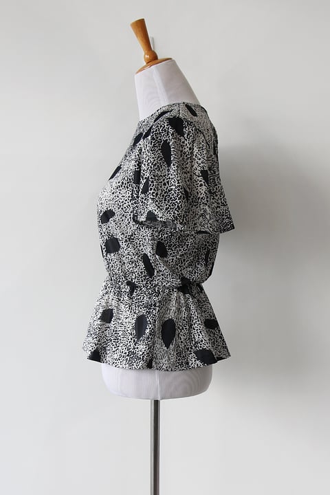 Image of SOLD Geometric Black And White Peplum Blouse