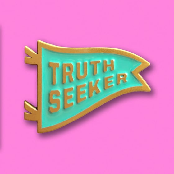 Image of “TRUTH SEEKER” ENAMEL PIN.