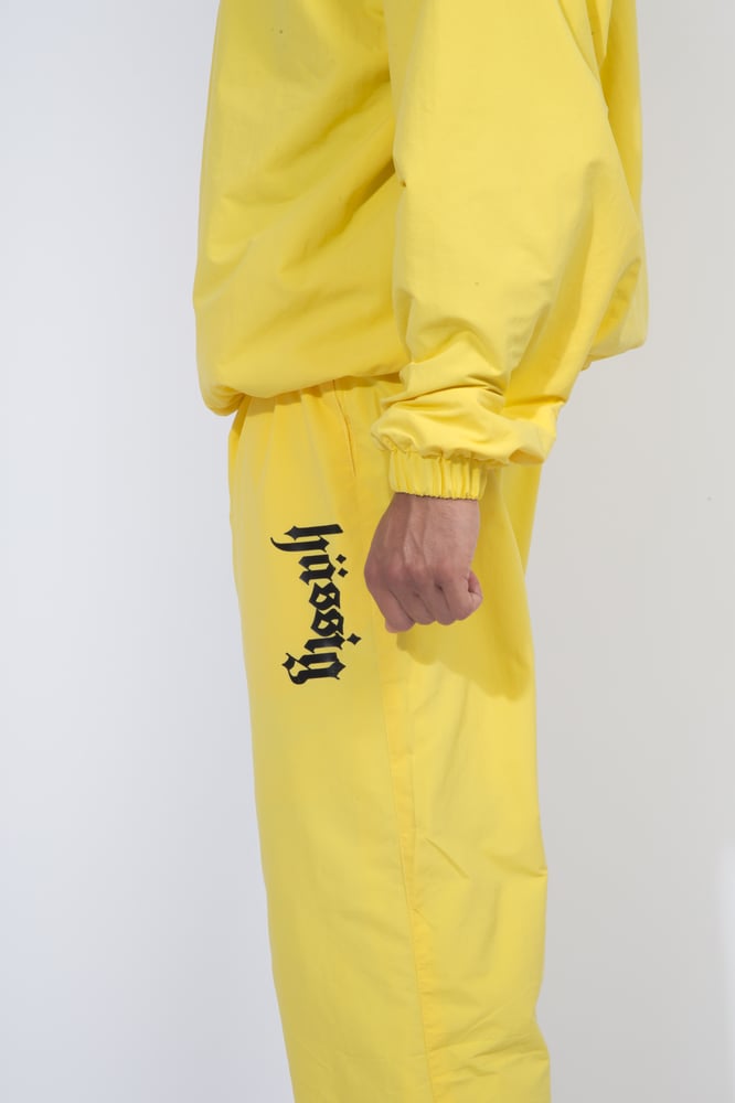 yellow and black tracksuit womens