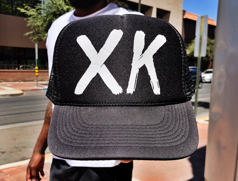 Image of Black 'XK' Trucker Hat