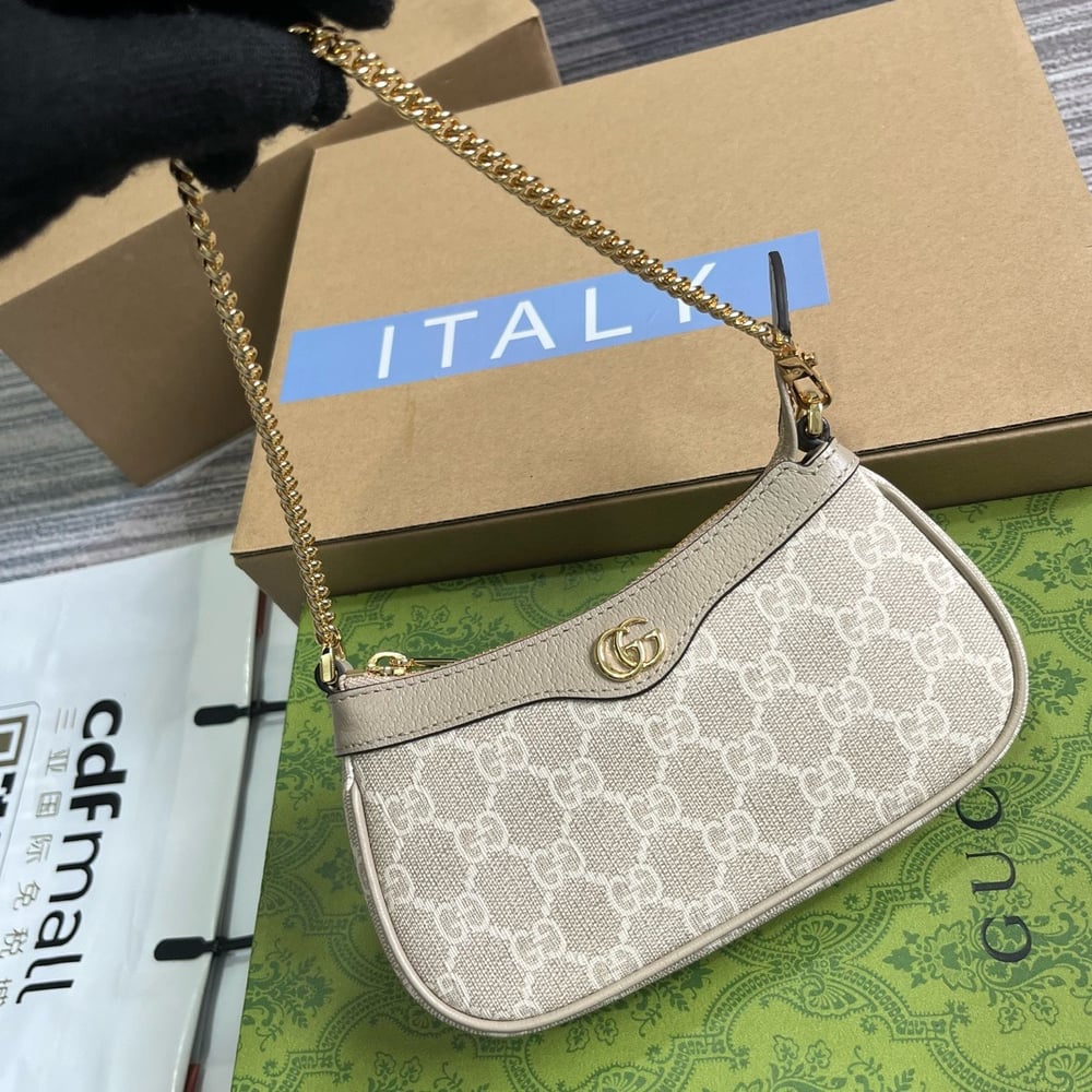 GG Canvas Mini Pochette 