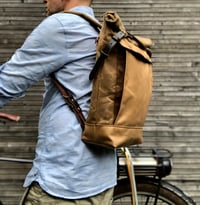 Image 1 of Backpack medium size rucksack in waxed canvas, with leather front pocket and bottom